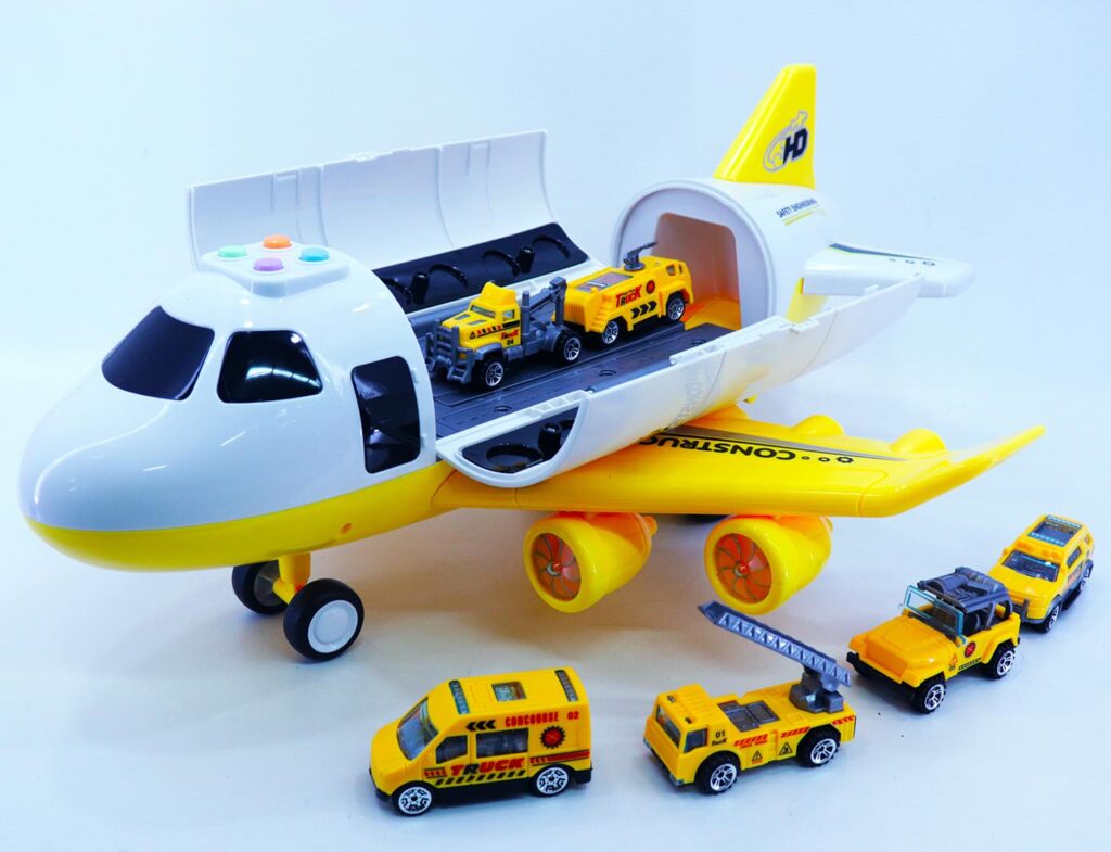 avión con carros de construcción